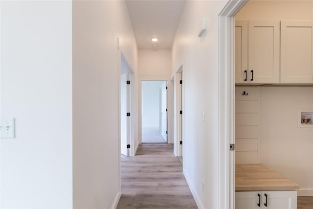 209 Pearl St, Ennis, MT 59729 - hallway with light wood-style floors, baseboards, and recessed lighting