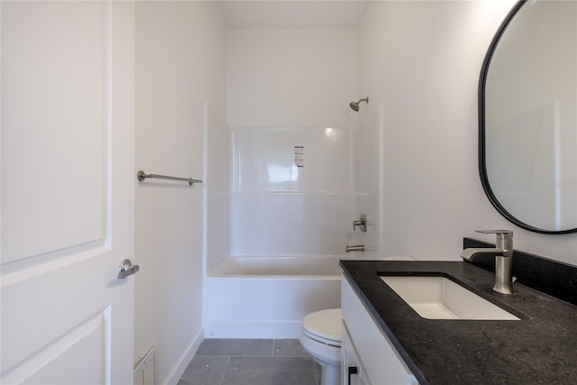 209 Pearl St, Ennis, MT 59729 - bathroom with toilet, vanity, tile patterned floors, and shower / bath combination