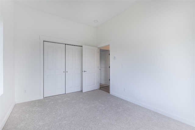 209 Pearl St, Ennis, MT 59729 - unfurnished bedroom with carpet flooring, baseboards, and a closet