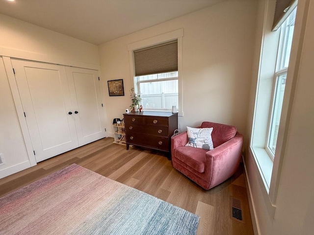 123 Owl Loop, Kalispell, MT 59901 - living area with visible vents, light wood-style flooring, and baseboards