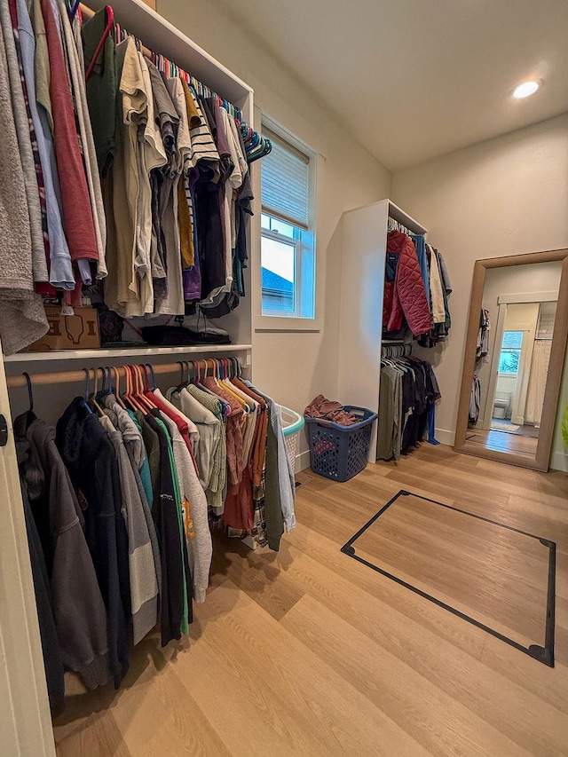 123 Owl Loop, Kalispell, MT 59901 - walk in closet featuring wood finished floors