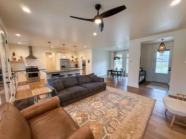 123 Owl Loop, Kalispell, MT 59901 - living area featuring recessed lighting, a ceiling fan, and light wood-type flooring