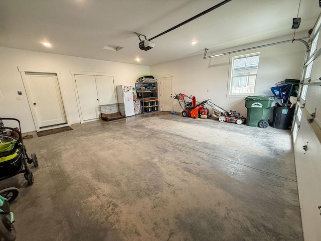 123 Owl Loop, Kalispell, MT 59901 - garage with recessed lighting and a garage door opener