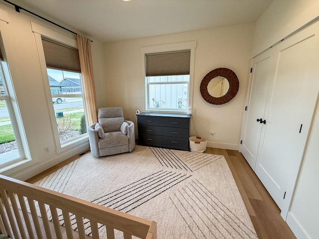 123 Owl Loop, Kalispell, MT 59901 - sitting room with baseboards and wood finished floors
