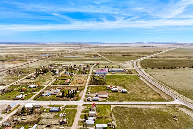 aerial view featuring a rural view and a mountain view