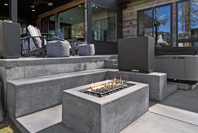 view of patio / terrace featuring a fire pit