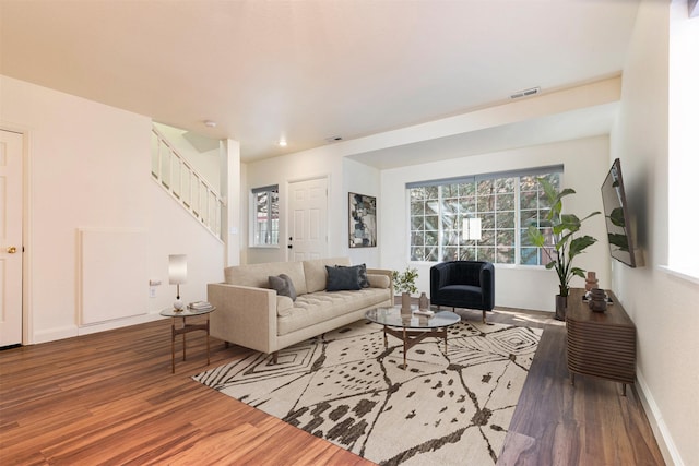 1312 Bridgecourt Way, Missoula, MT 59801 - living room with wood finished floors, stairs, baseboards, and recessed lighting
