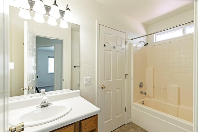 1312 Bridgecourt Way, Missoula, MT 59801 - full bath with vanity, healthy amount of natural light,  shower combination, and a textured wall