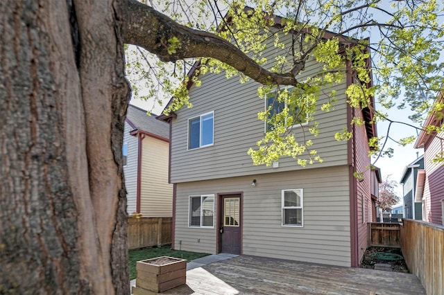 1312 Bridgecourt Way, Missoula, MT 59801 - rear view of property with a deck and a fenced backyard