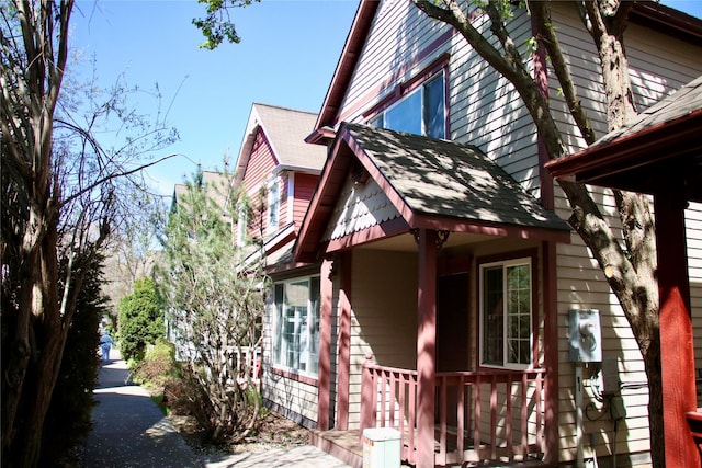 1312 Bridgecourt Way, Missoula, MT 59801 - view of property exterior featuring roof with shingles and covered porch