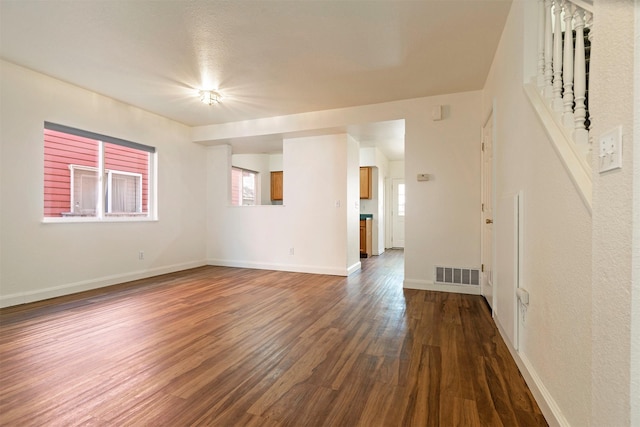 1312 Bridgecourt Way, Missoula, MT 59801 - unfurnished room with dark wood-style floors and baseboards