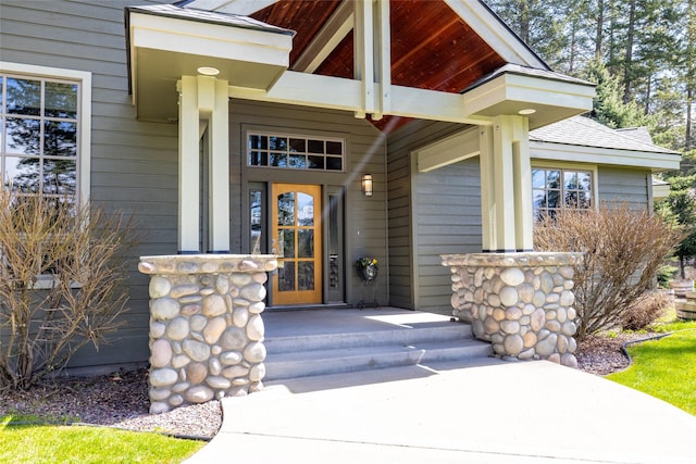doorway to property featuring a porch