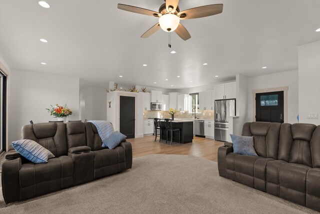 21 Bear Paw Loop, Bigfork, MT 59911 - living room featuring recessed lighting, light wood-style floors, and ceiling fan