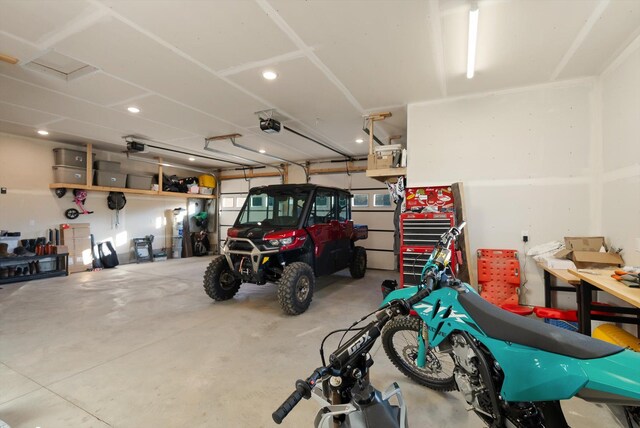 21 Bear Paw Loop, Bigfork, MT 59911 - garage with a garage door opener and recessed lighting