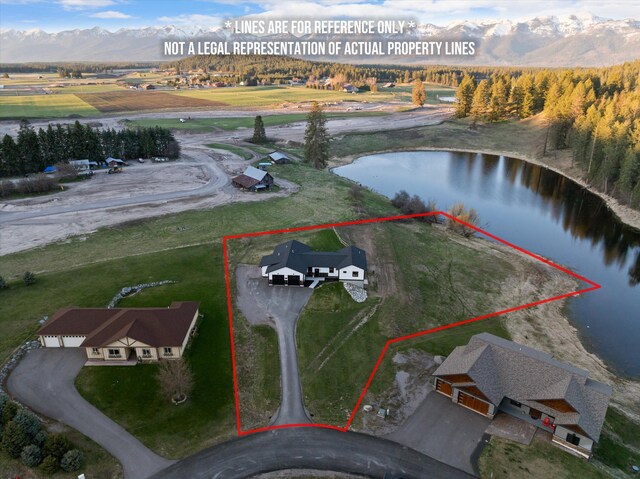 21 Bear Paw Loop, Bigfork, MT 59911 - aerial view of property's location with a water and mountain view and property boundaries highlighted