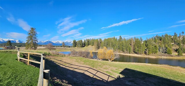 21 Bear Paw Loop, Bigfork, MT 59911 - view of yard featuring a water and mountain view