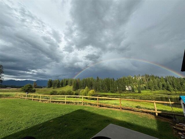 21 Bear Paw Loop, Bigfork, MT 59911 - view of yard with a view of countryside, a wooded view, and a mountain view