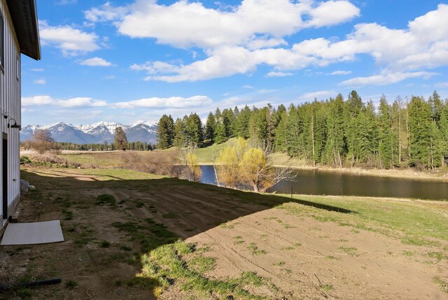 21 Bear Paw Loop, Bigfork, MT 59911 - view of yard featuring a water and mountain view