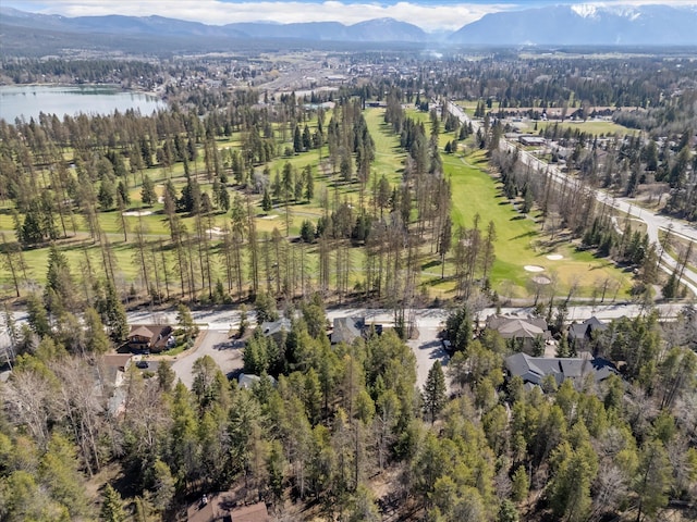 bird's eye view with a water and mountain view