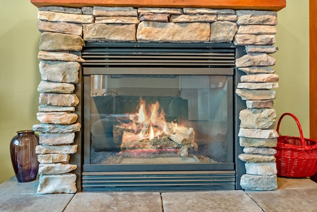 interior details with a fireplace