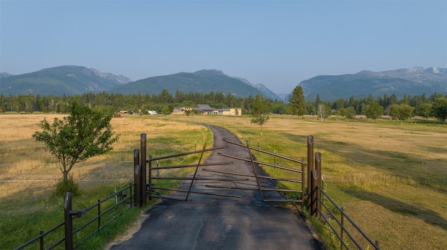 view of mountain background featuring rural landscape