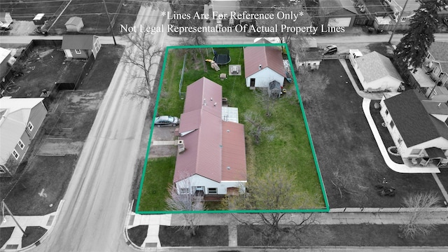 648 7th Ave W, Kalispell, MT 59901 - aerial perspective of suburban area featuring property parcel outlined