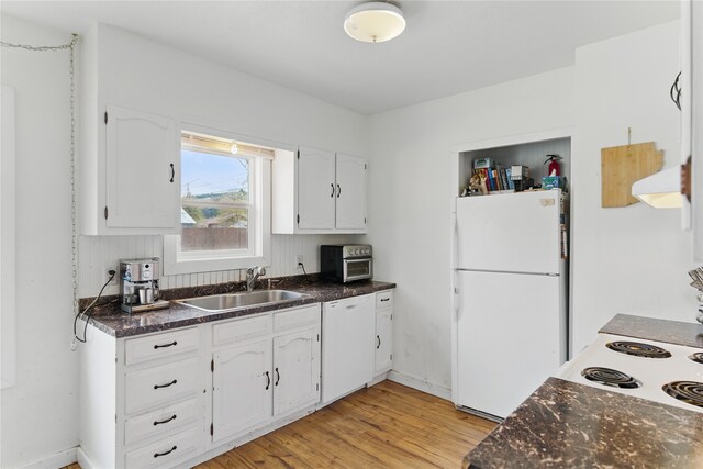 648 7th Ave W, Kalispell, MT 59901 - kitchen featuring white appliances, a sink, white cabinets, and light wood-style flooring
