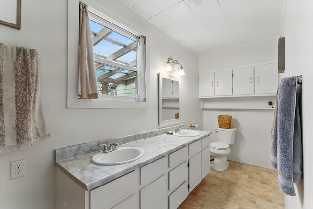 648 7th Ave W, Kalispell, MT 59901 - full bathroom with toilet and double vanity
