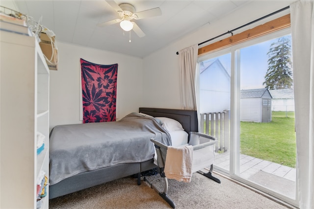 648 7th Ave W, Kalispell, MT 59901 - bedroom with carpet floors, access to exterior, and a ceiling fan