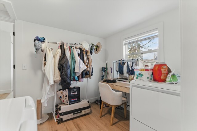 648 7th Ave W, Kalispell, MT 59901 - walk in closet featuring washer / clothes dryer and light wood finished floors