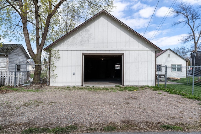 648 7th Ave W, Kalispell, MT 59901 - detached garage featuring fence and driveway