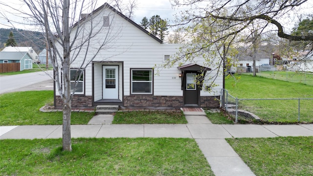 648 7th Ave W, Kalispell, MT 59901 - view of front of home featuring stone siding