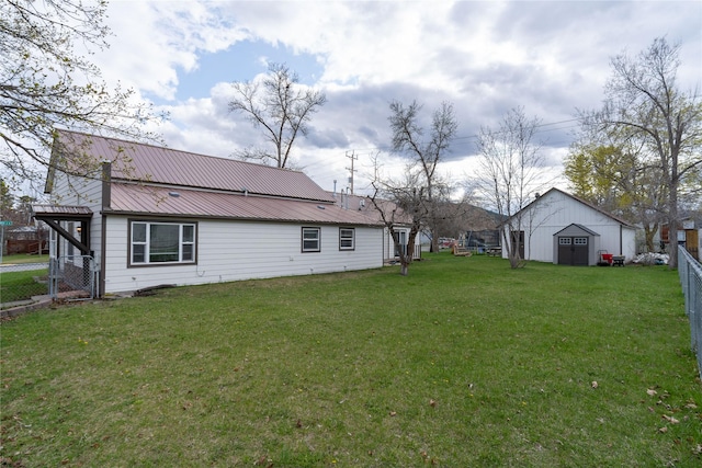 648 7th Ave W, Kalispell, MT 59901 - view of yard featuring a shed and an outdoor structure