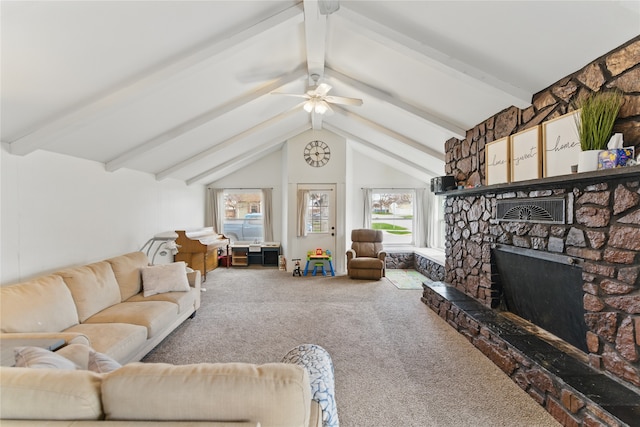 648 7th Ave W, Kalispell, MT 59901 - living room with carpet, a stone fireplace, and ceiling fan