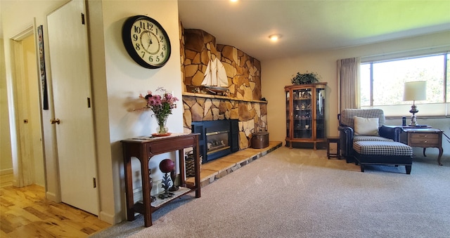 3208 Paul Ln, Missoula, MT 59803 - living area with a stone fireplace and carpet flooring