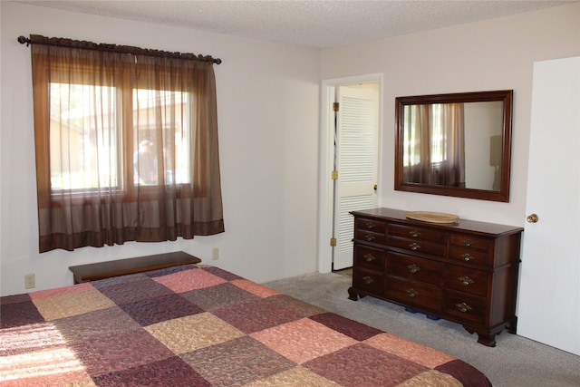 3208 Paul Ln, Missoula, MT 59803 - bedroom featuring light colored carpet and a textured ceiling