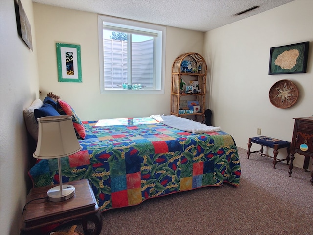 3208 Paul Ln, Missoula, MT 59803 - bedroom with a textured ceiling, carpet flooring, and visible vents