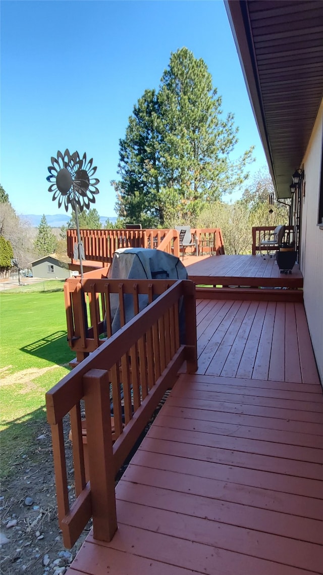3208 Paul Ln, Missoula, MT 59803 - wooden deck featuring a lawn