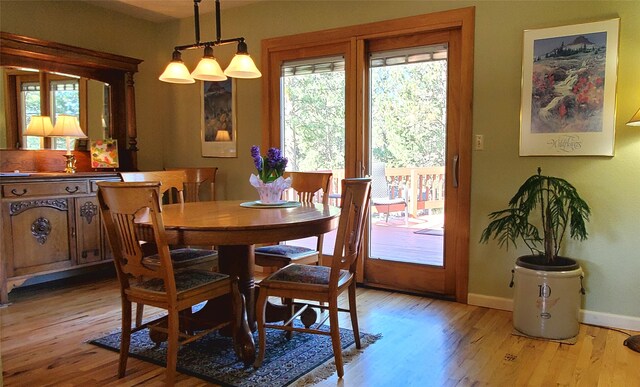 3208 Paul Ln, Missoula, MT 59803 - dining space with light wood finished floors, a wealth of natural light, and baseboards
