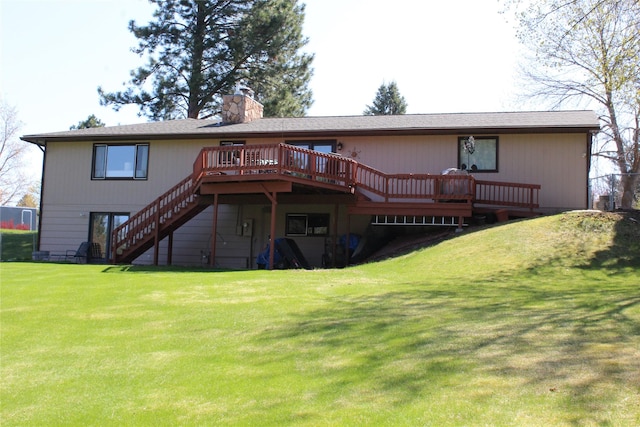 3208 Paul Ln, Missoula, MT 59803 - back of property with a deck, a yard, stairway, and a chimney