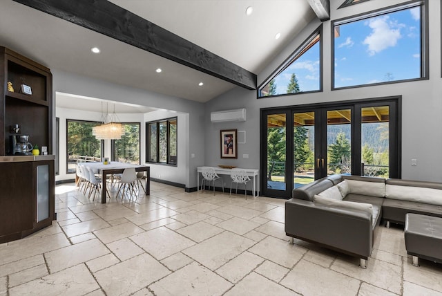 15 Copper Ridge Rd, Trout Creek, MT 59874 - living room featuring an AC wall unit, beam ceiling, high vaulted ceiling, stone tile floors, and recessed lighting
