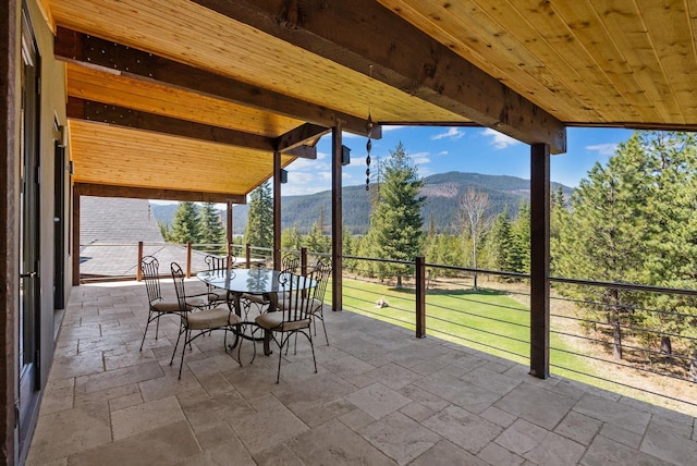 15 Copper Ridge Rd, Trout Creek, MT 59874 - view of patio / terrace with a mountain view and outdoor dining space