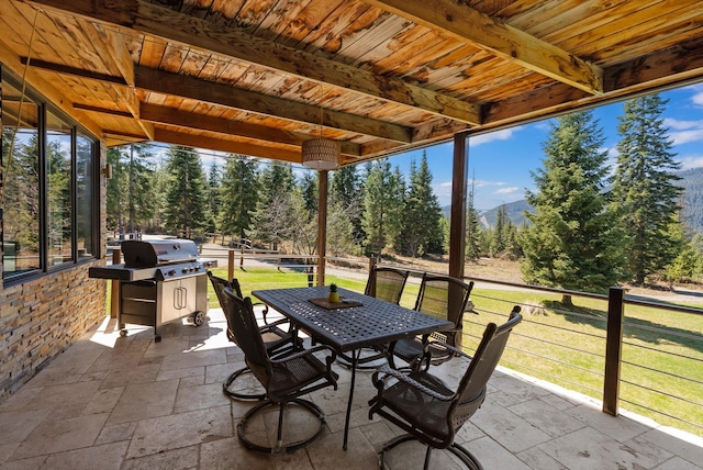 15 Copper Ridge Rd, Trout Creek, MT 59874 - view of patio / terrace featuring a grill, a mountain view, and outdoor dining area