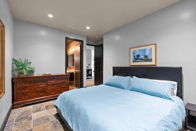 15 Copper Ridge Rd, Trout Creek, MT 59874 - bedroom featuring stone finish floors, recessed lighting, and baseboards