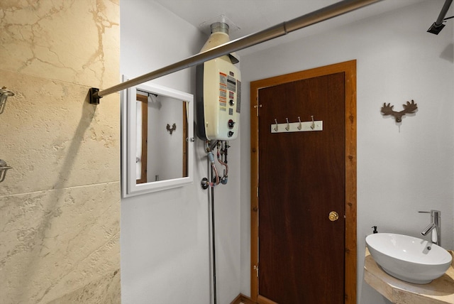 15 Copper Ridge Rd, Trout Creek, MT 59874 - bathroom with tankless water heater and vanity