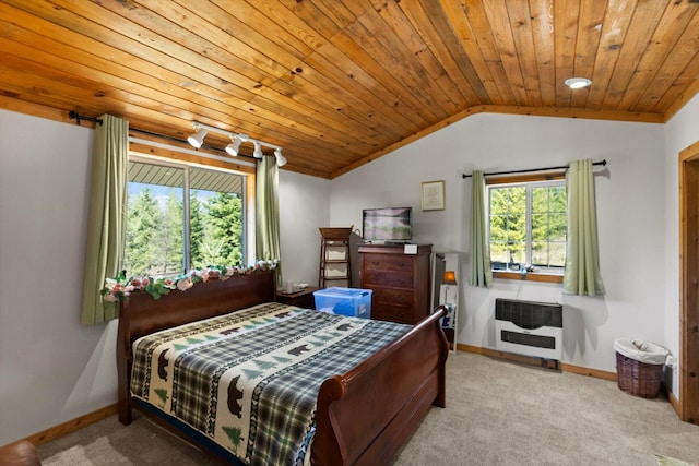 15 Copper Ridge Rd, Trout Creek, MT 59874 - carpeted bedroom featuring heating unit, baseboards, vaulted ceiling, and wooden ceiling