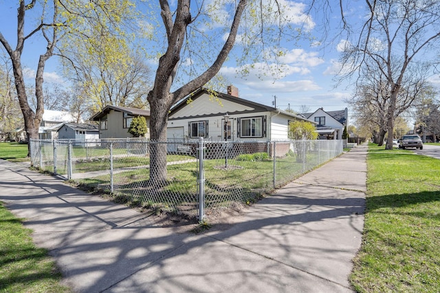 bungalow featuring a front yard, a fenced front yard, and a chimney
