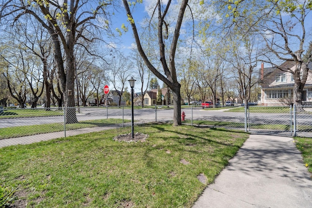 exterior space with a gate and fence