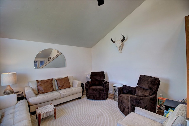 living room with vaulted ceiling