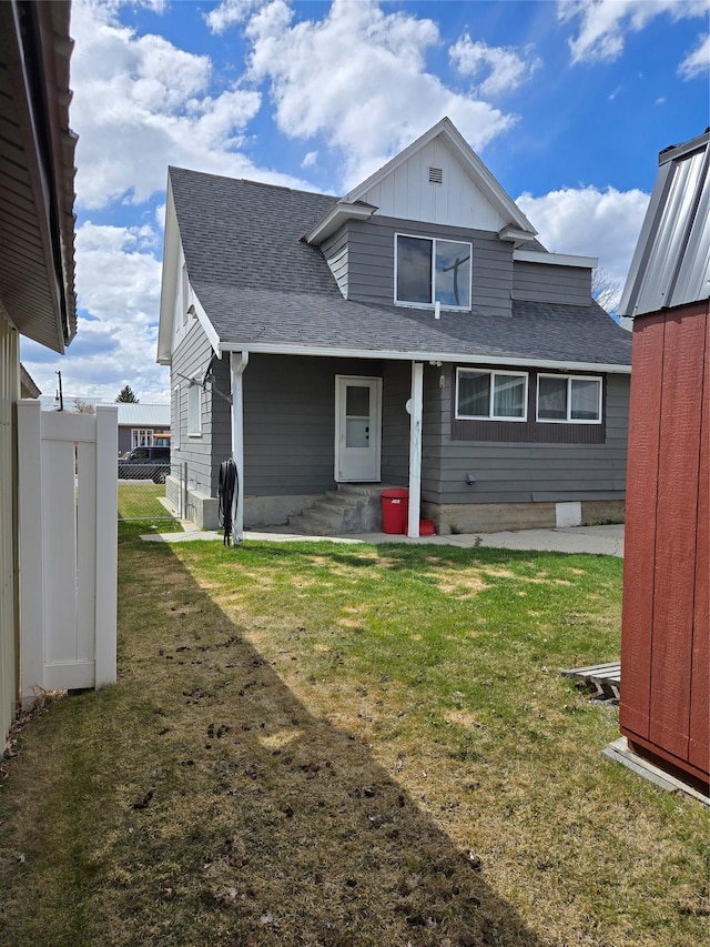 1512 Gaylord St, Butte, MT 59701 - exterior space with roof with shingles, board and batten siding, and a lawn